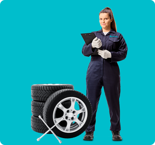 Image of a lady in jumpsuit with some tires