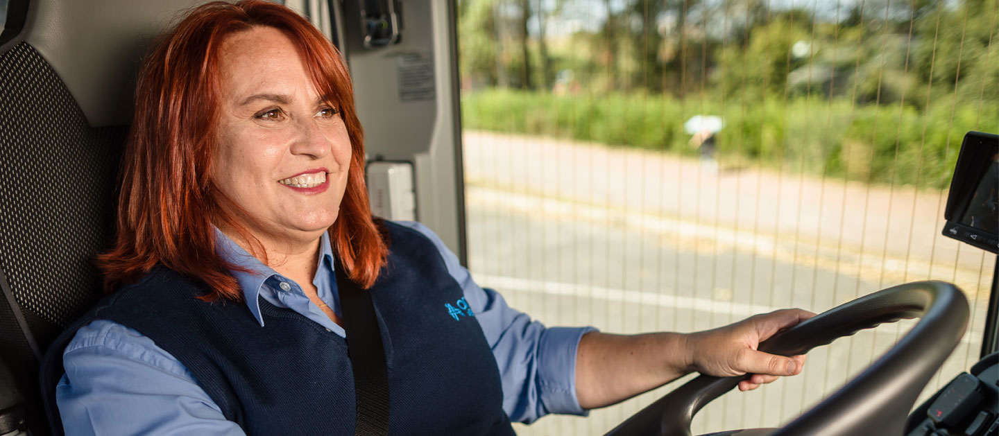 A women driving a vehicle